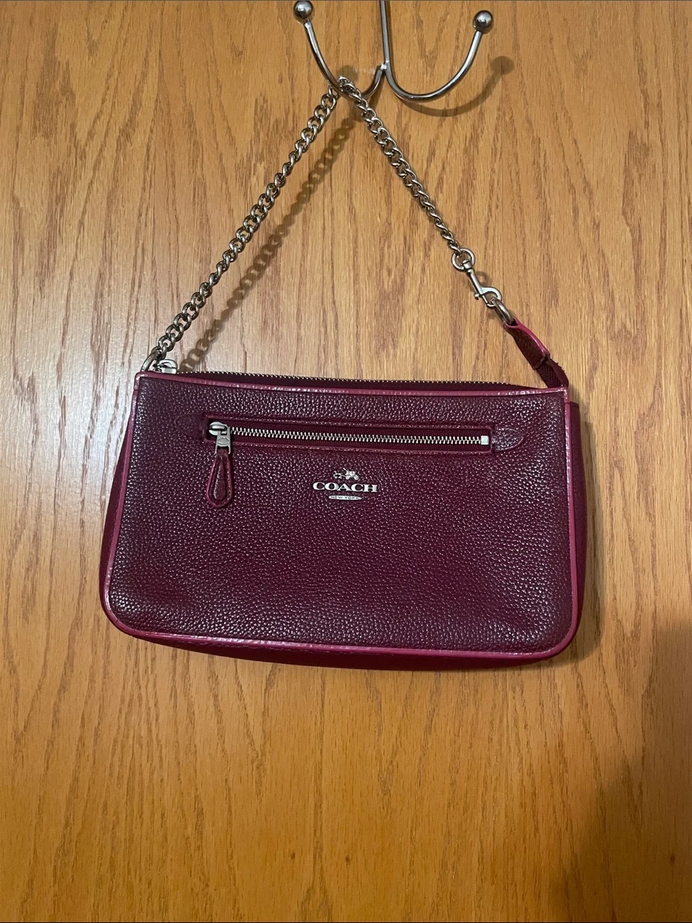 Coach Nolita 24 wristlet pebbled leather burgundy/oxblood